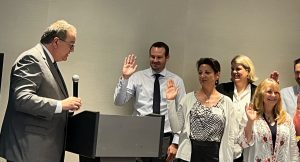 Attorney Amber Davids is sworn in by Honorable Judge Michael S. Orfinger at the Annual Meeting of the Volusia County Bar Association in Daytona Beach, Florida.